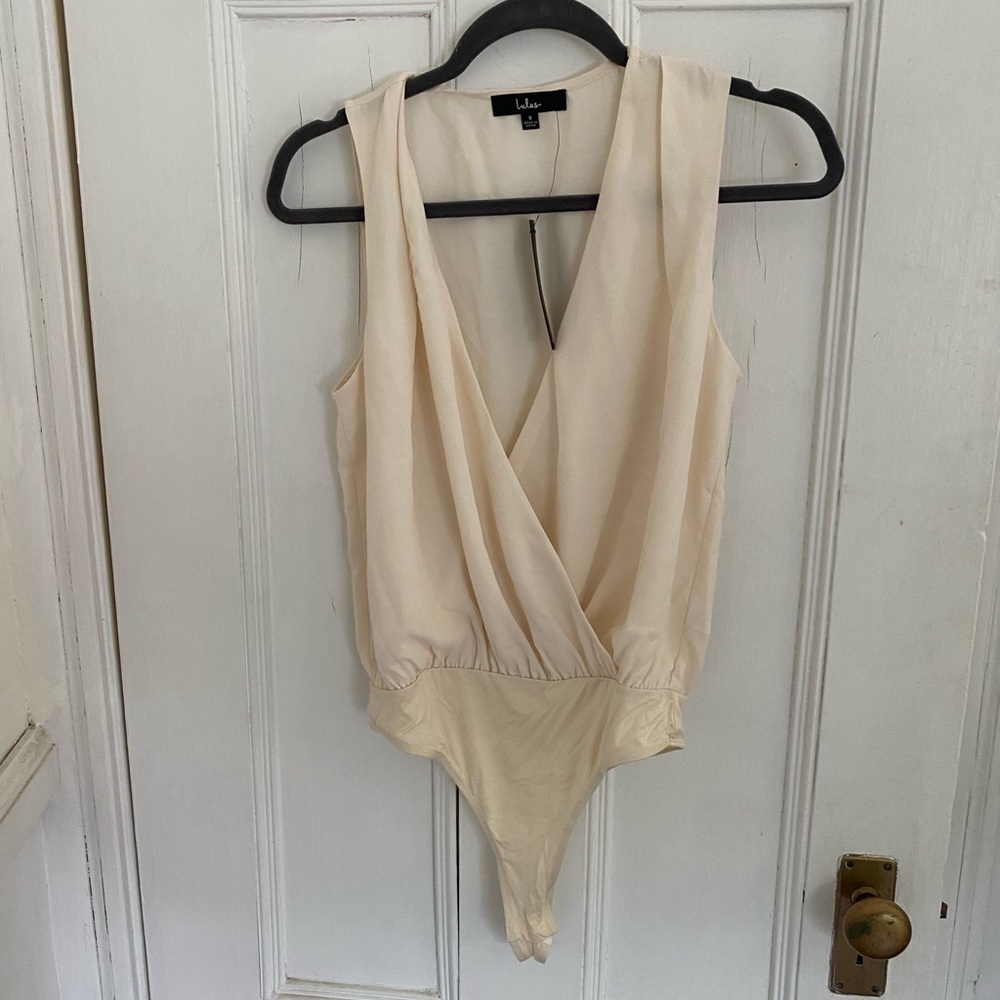 Drape front body suit in cream NWT